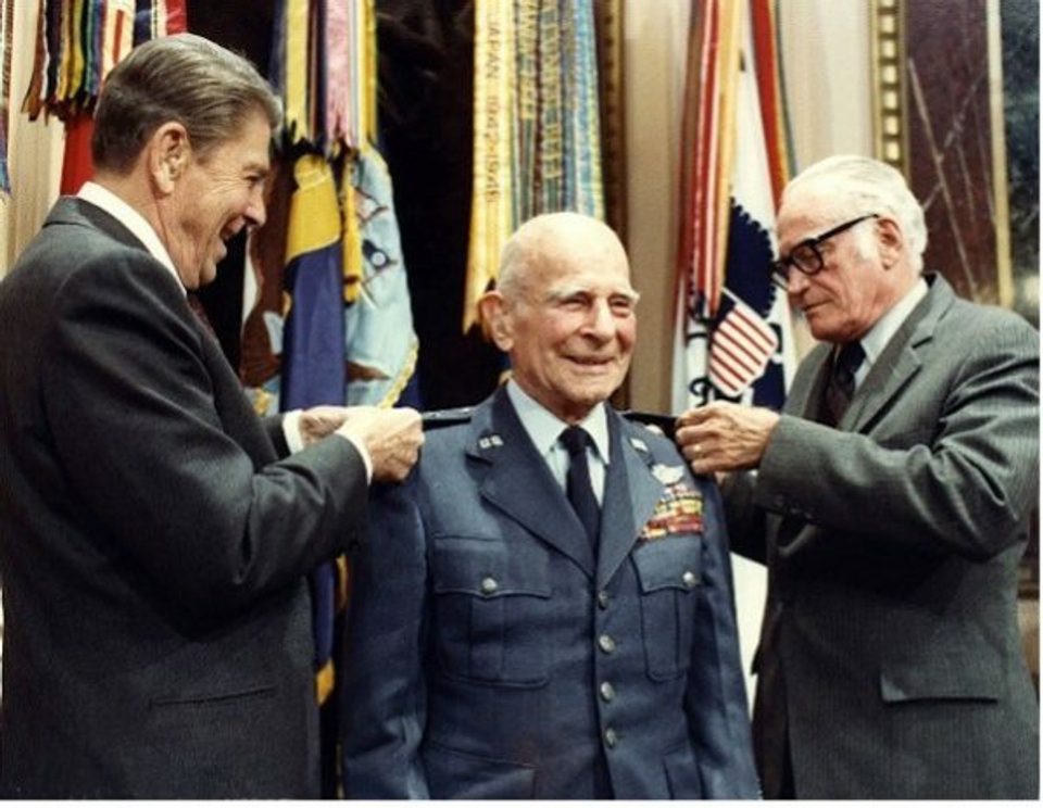 A photo of President Reagan awarding Doolittle a fourth star