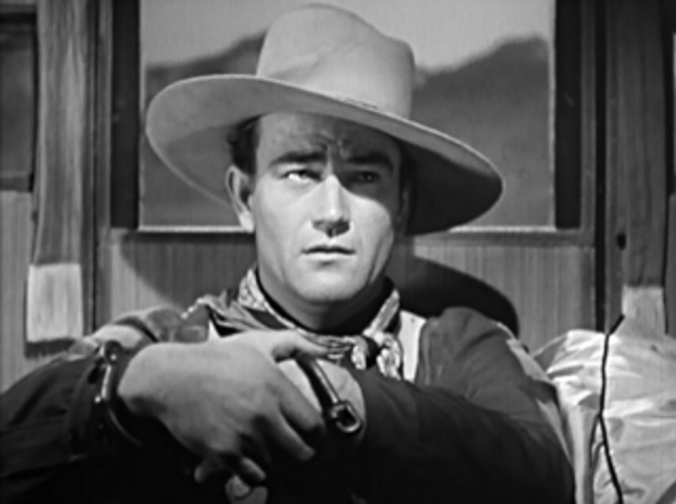 : A shot of John Wayne from his breakout role in the film Stagecoach