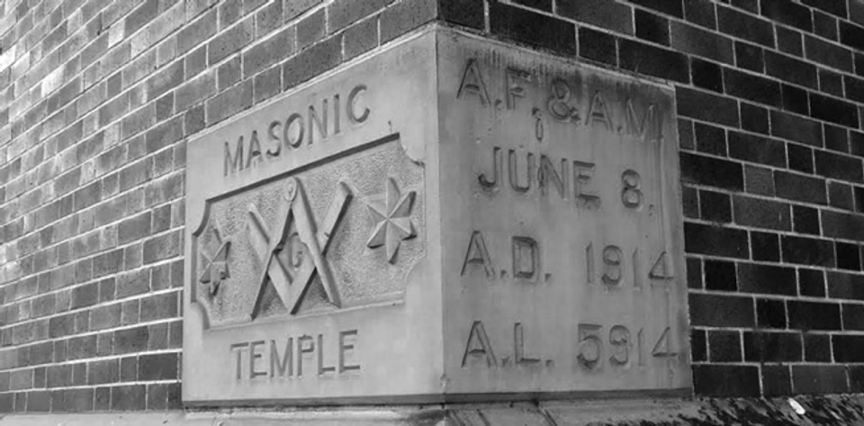A cornerstone with Masonic emblems